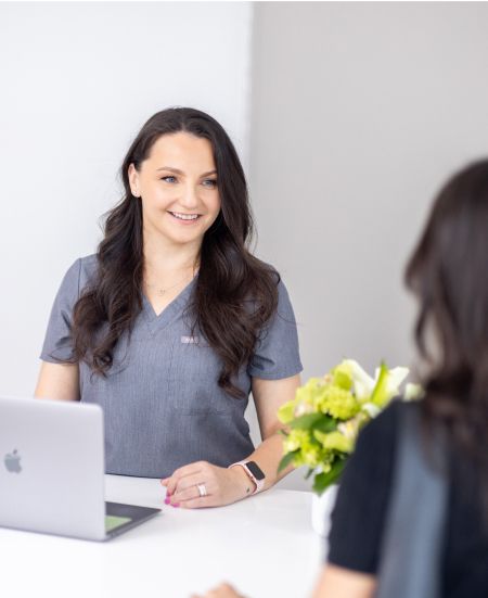 clark dental care staff speaking with patient